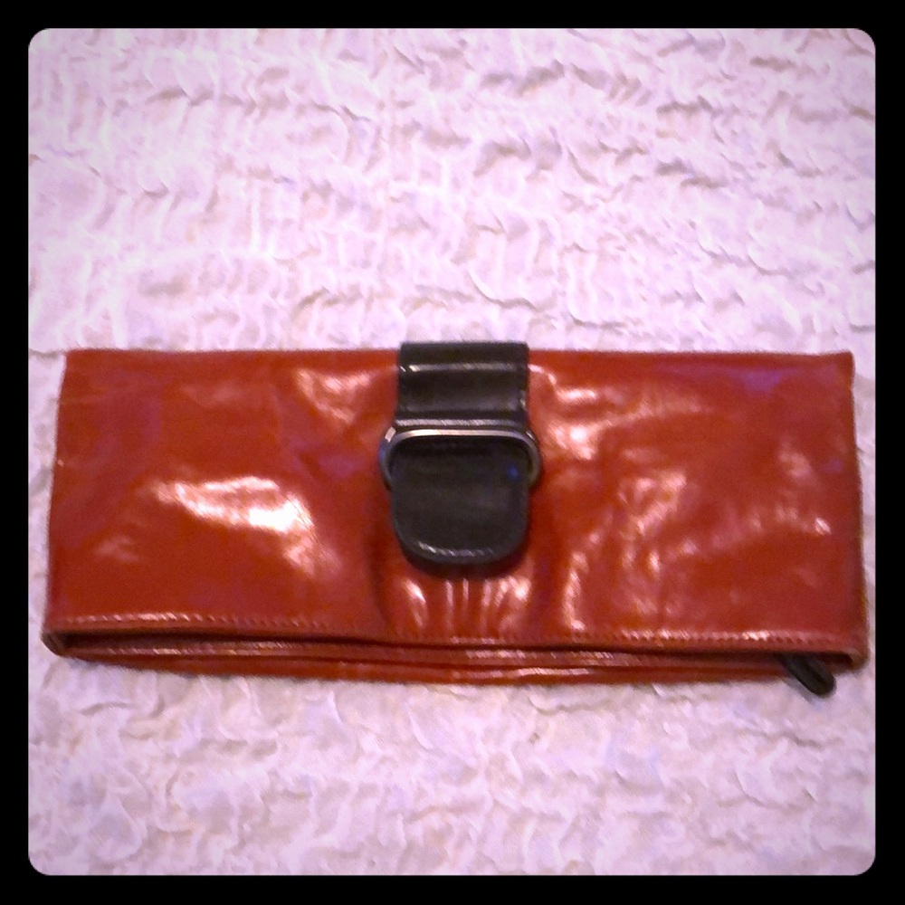 Waxed leather clutch
